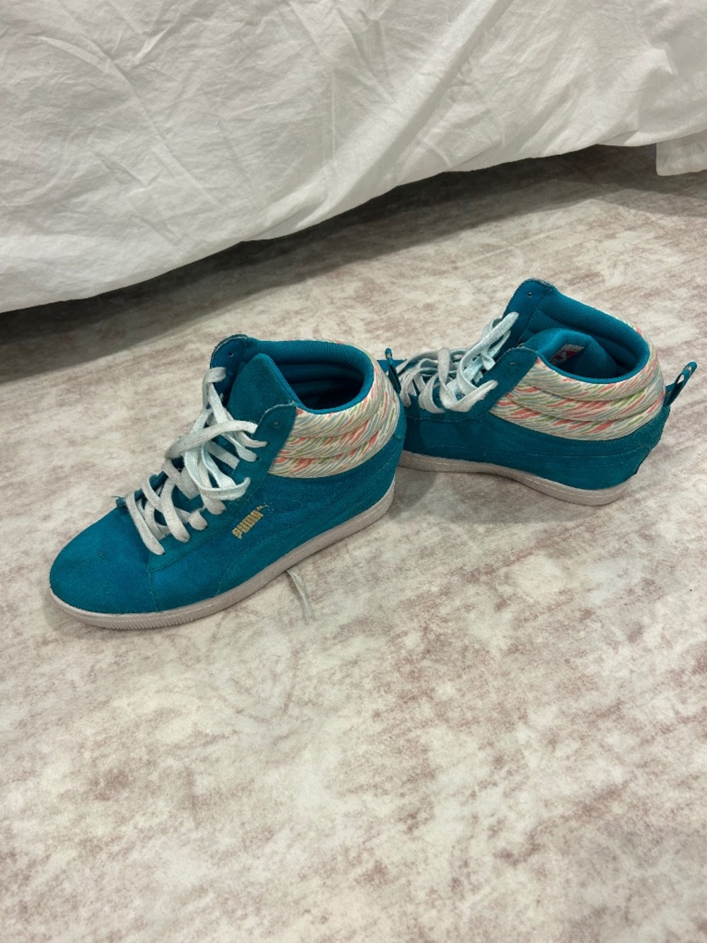 High top puma sneakers
